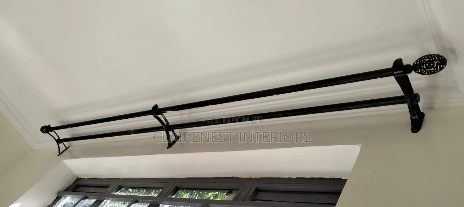 Powder-Coated Support for Clean Window Décor.