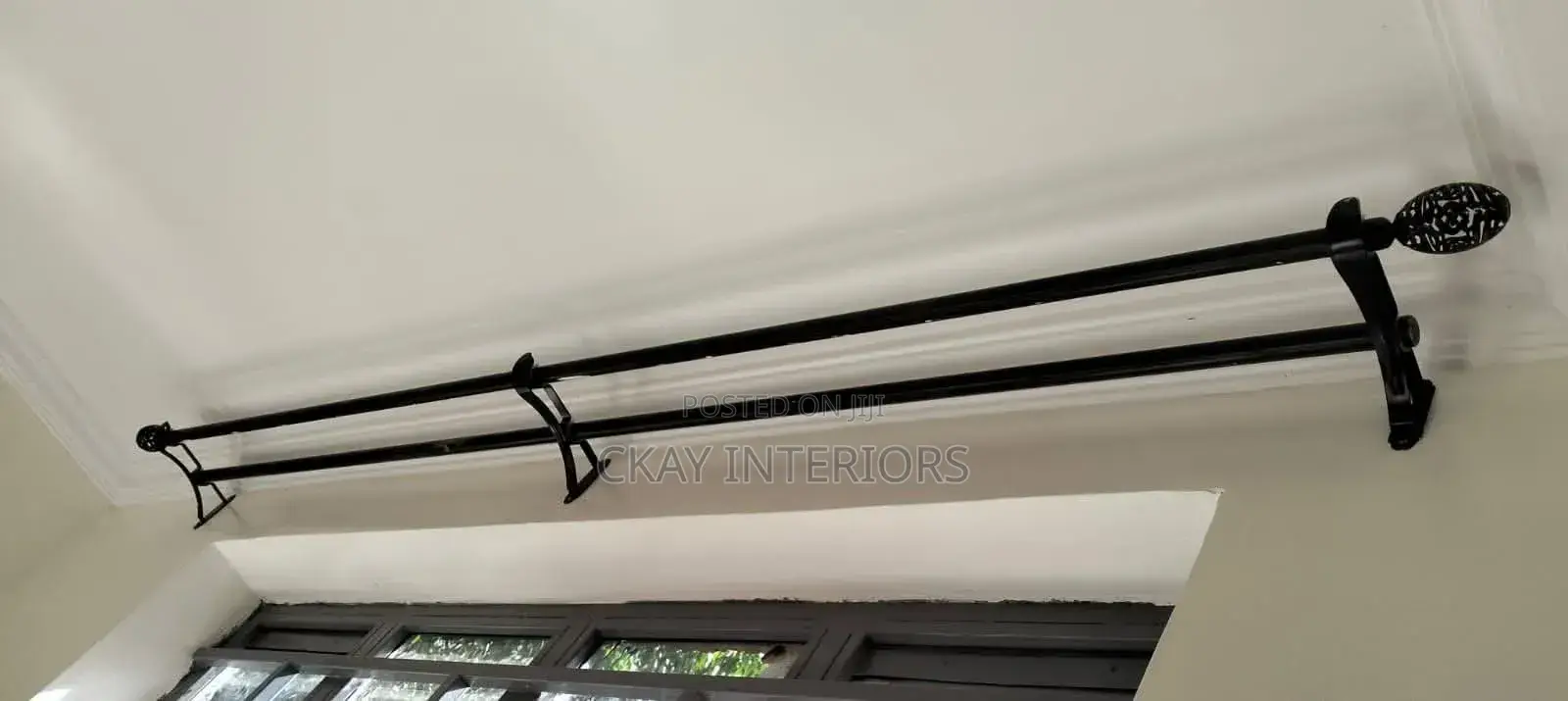 Powder-Coated Support for Clean Window Décor.