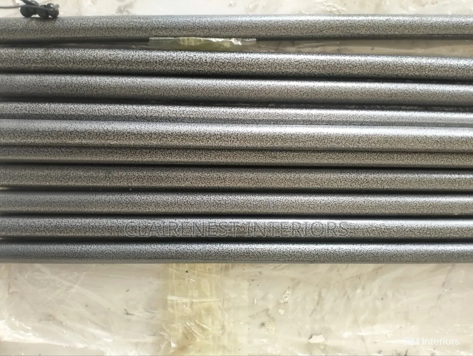 Powder-Coated Support for Clean Window Décor.