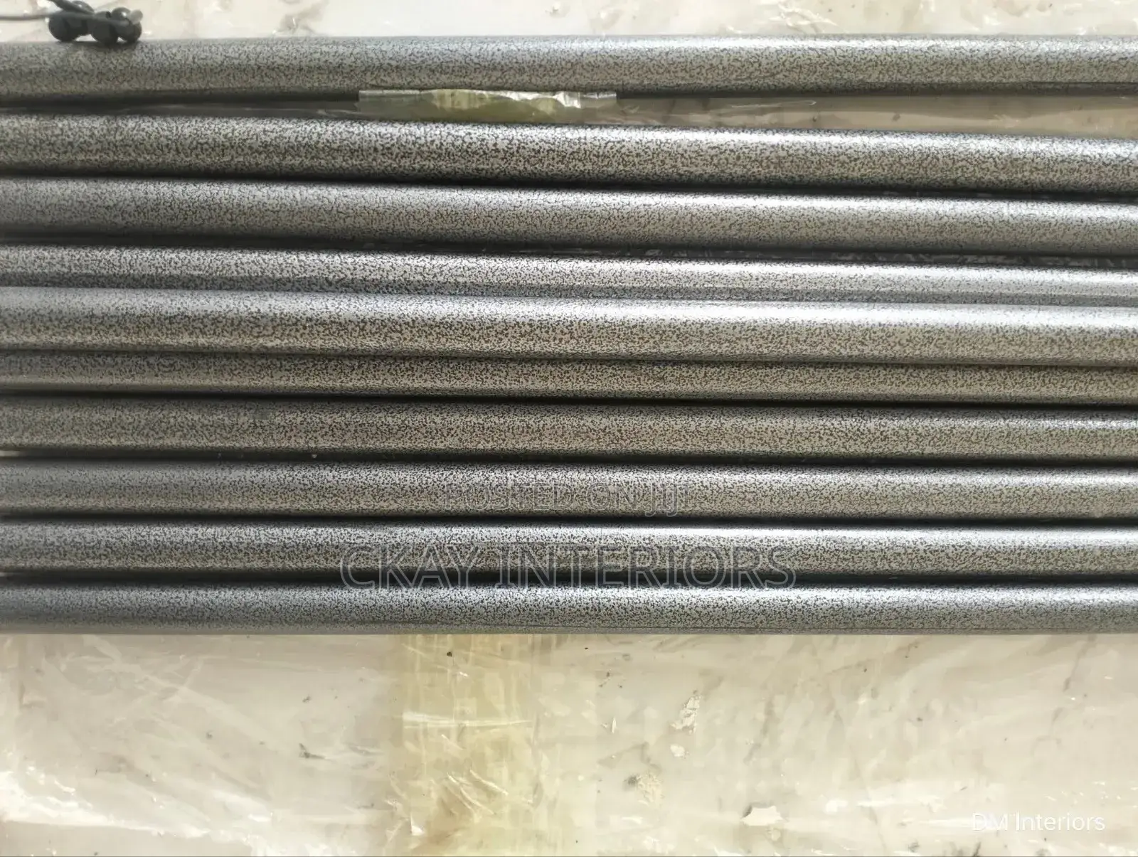 Powder-Coated Support for Clean Window Décor.