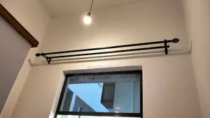 Antic and Black Stylish Rods for Polished Curtain Setups.