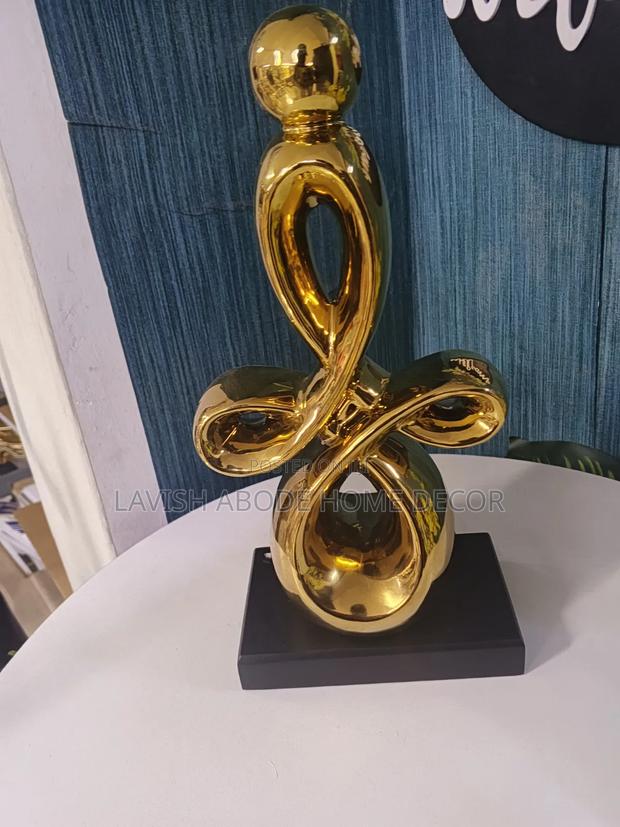 Abstract Gold Decor – Elegant Decorative Accent Piece