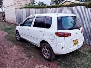 Mazda 323 2006 White