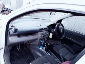 Mazda 323 2006 White