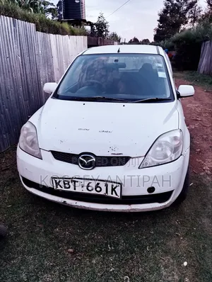 Mazda 323 2006 White