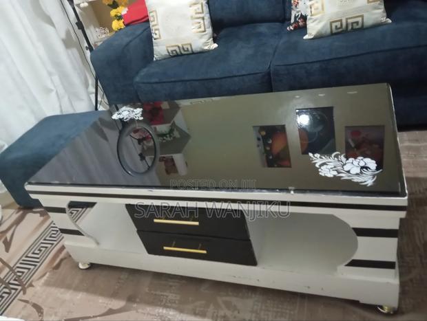 Selling a TV  Stand and a Table