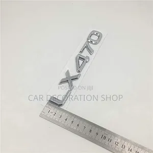 Chrome LX470 Lettering Decal Badge Mounted in Rear Trunk