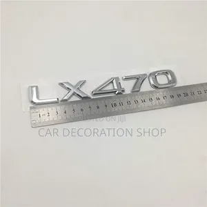 Chrome LX470 Lettering Decal Badge Mounted in Rear Trunk