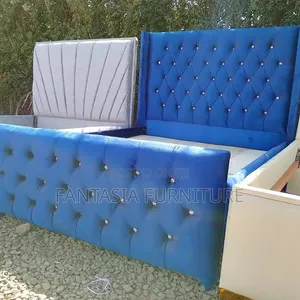 Chesterfield 5 by 6 Tufted Bed.