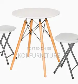 Home Tables; Round Eames Dining Table With Wooden Legs