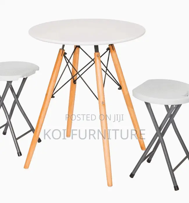 Home Tables; Round Eames Dining Table With Wooden Legs