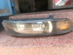 Headlight Lancer GDI