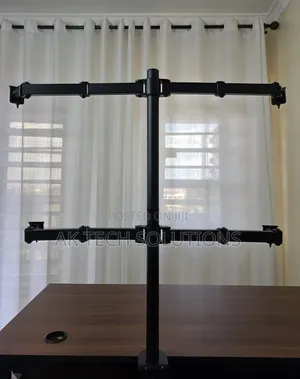 Quad Monitor Stand 
Supports 24 and 27 Inch 
Height Adjustable
