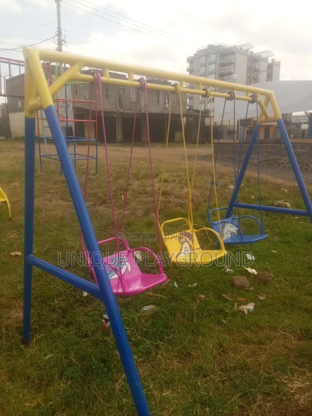 Playground Equipment Swings Slides and Seesaw