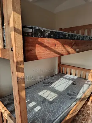 Double-Decker Bunk Bed + 2 Mattresses (3x6) – Excellent Condition
