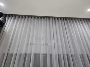 Plain White Sheers That Help Create Restful Rooms