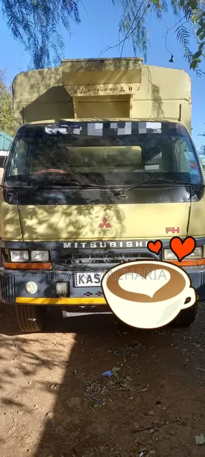 Mistubishi FH 215 Local 2006 Yellow