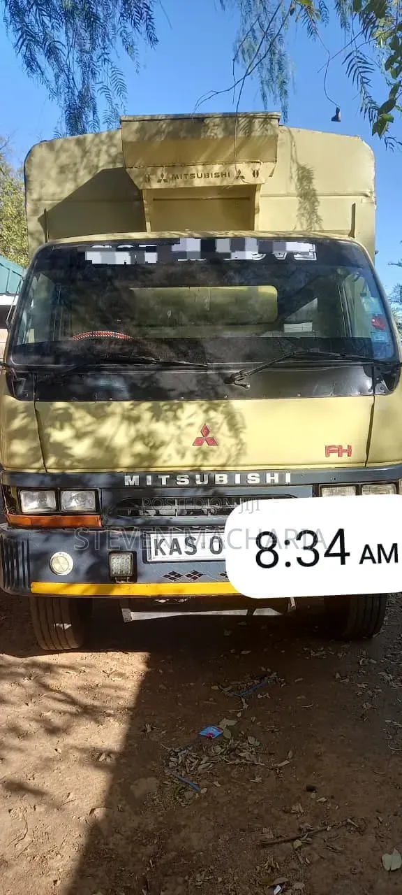 Mistubishi FH 215 Local 2006 Yellow