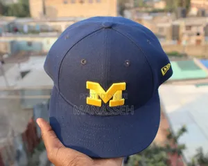 New Era 59FIFTY Michigan Wolverines Fitted Cap.