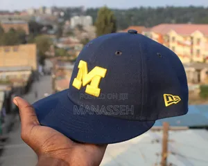 New Era 59FIFTY Michigan Wolverines Fitted Cap.