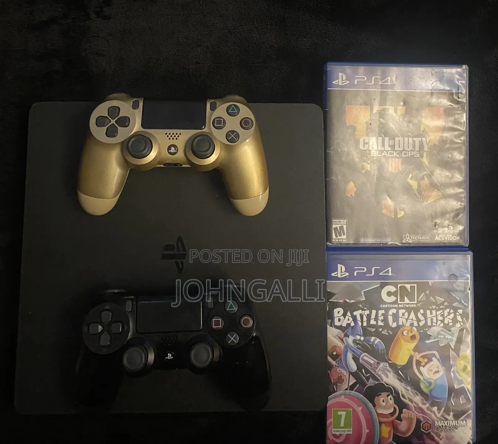 1TB PS4 Slim + 2 Controllers + 2 Games