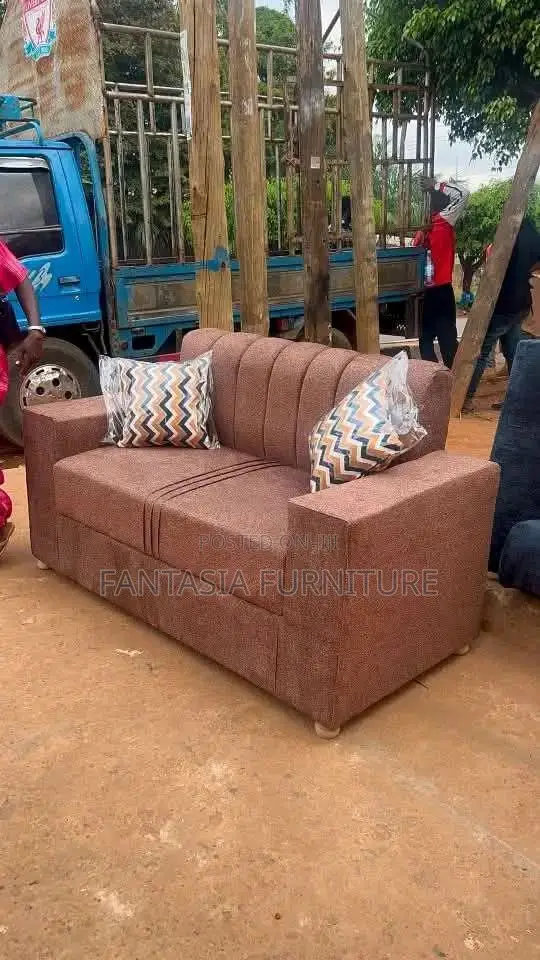 2-Seater Brown Loveseat Sofa + Chevron Pillows