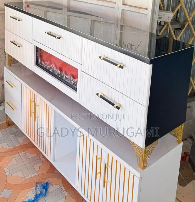Modern Executive TV Stand With a Functional Fire Place