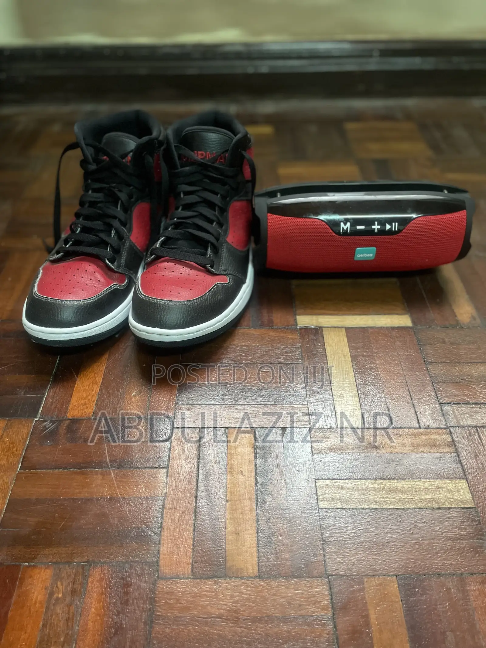 Black/Red High-Top Sneakers and AERBES Bluetooth Speaker
