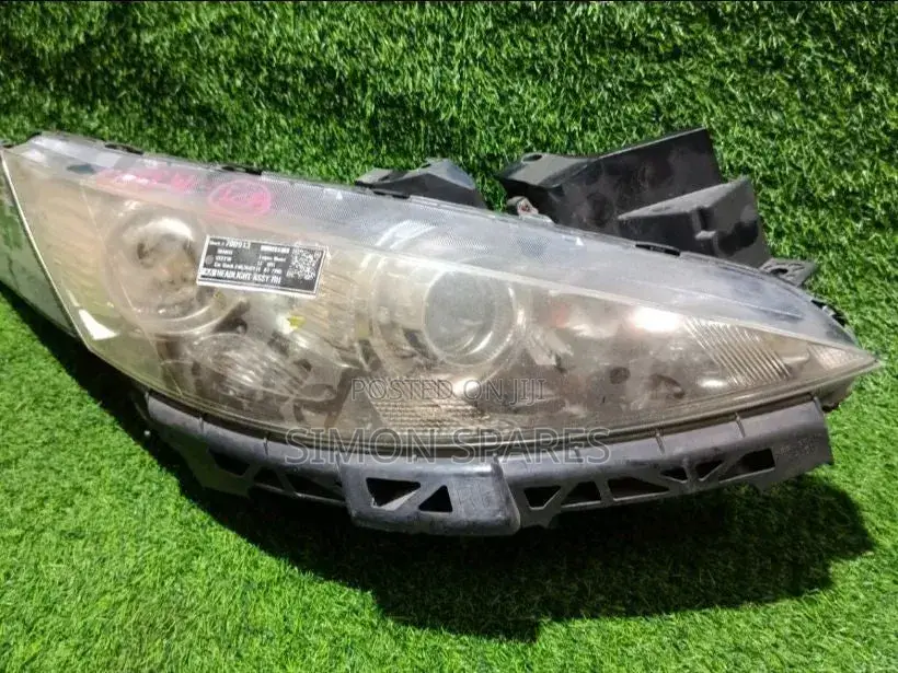 Headlight Assy Rh Mazda Biante  2011