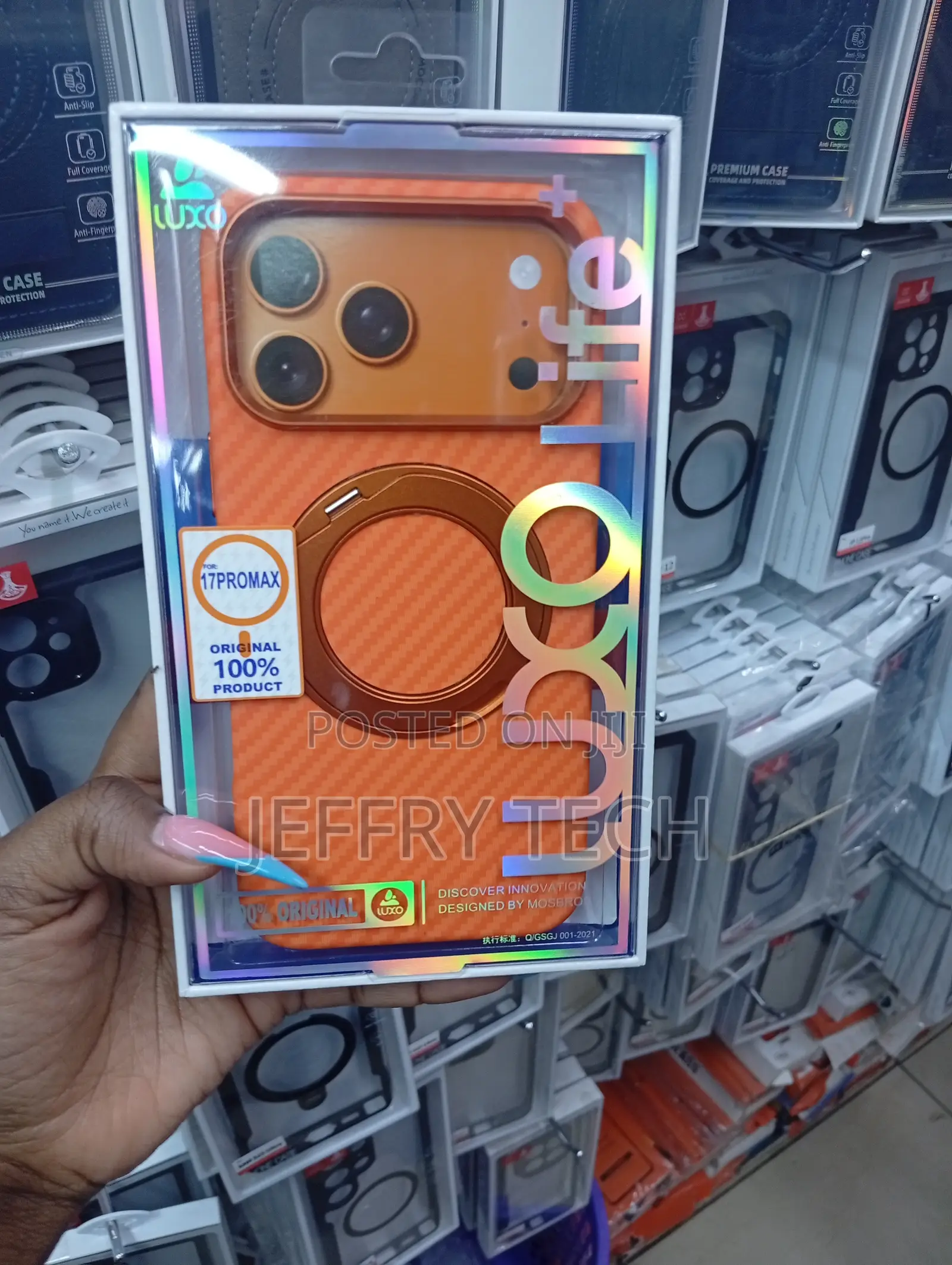 Orange Carbon-Fiber iPhone 17 Pro Max With a Rotatable Magnetic Ring