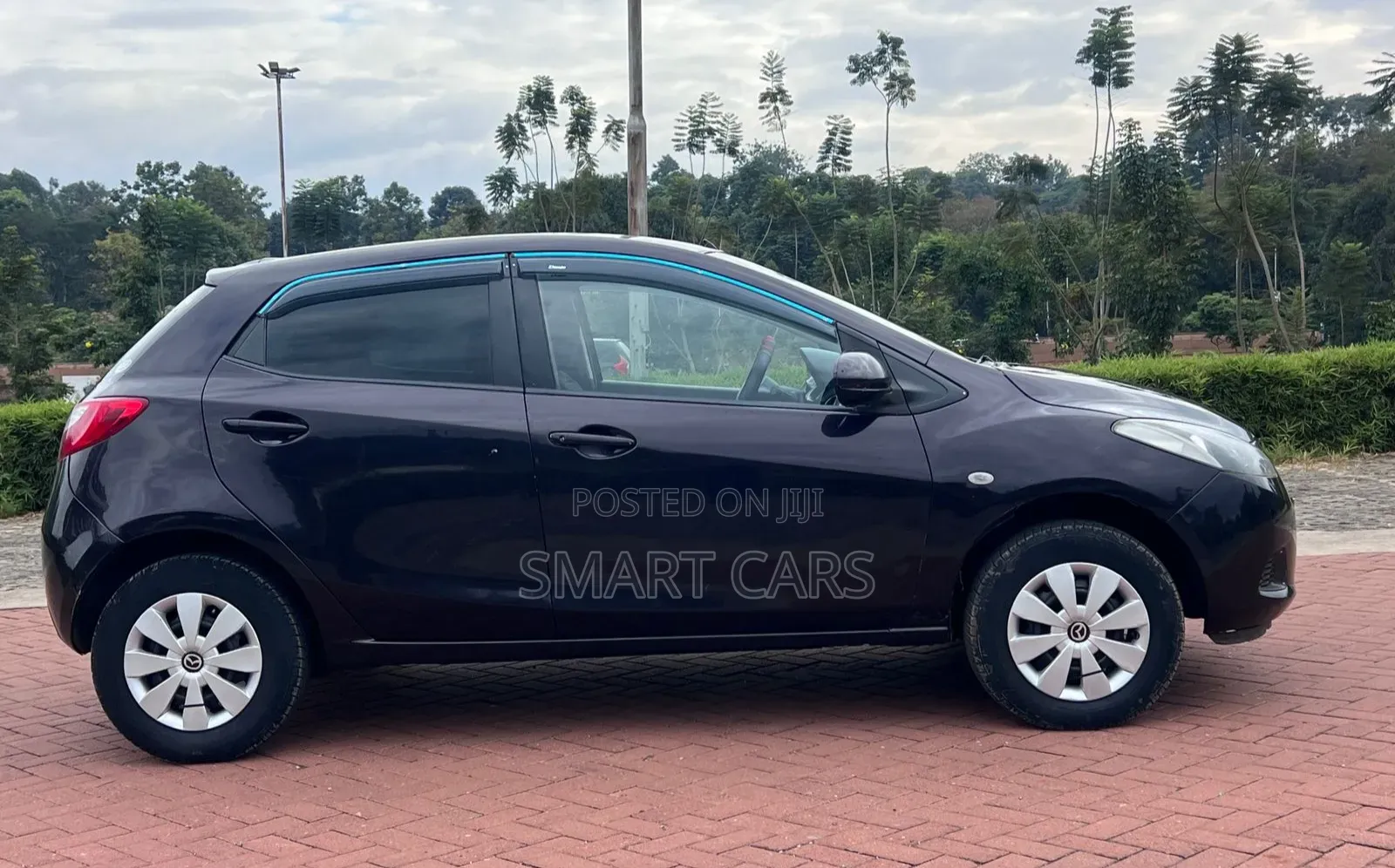 Mazda Demio 2012 Brown