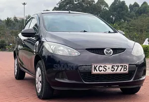 Mazda Demio 2012 Brown