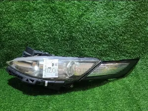 Headlight Assy Lh Mazda Biante Xenon  2011