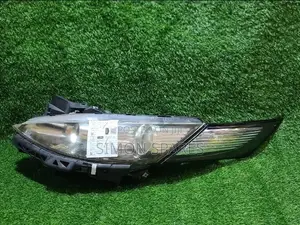 Headlight Assy Lh Mazda Biante Xenon  2011