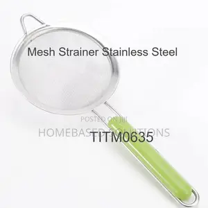 12 CM Stainless Steel Mesh Strainer With a Lime Green Handle.