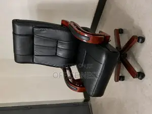 High-Back Leather Chair With Wooden Arms
