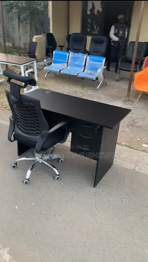 Black Office Desk With Mesh Swivel Chair