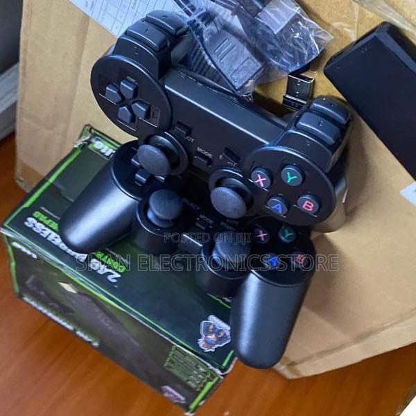 M8 Lite 2.4G HDMI Wireless Game Stick – Plug & Play Console