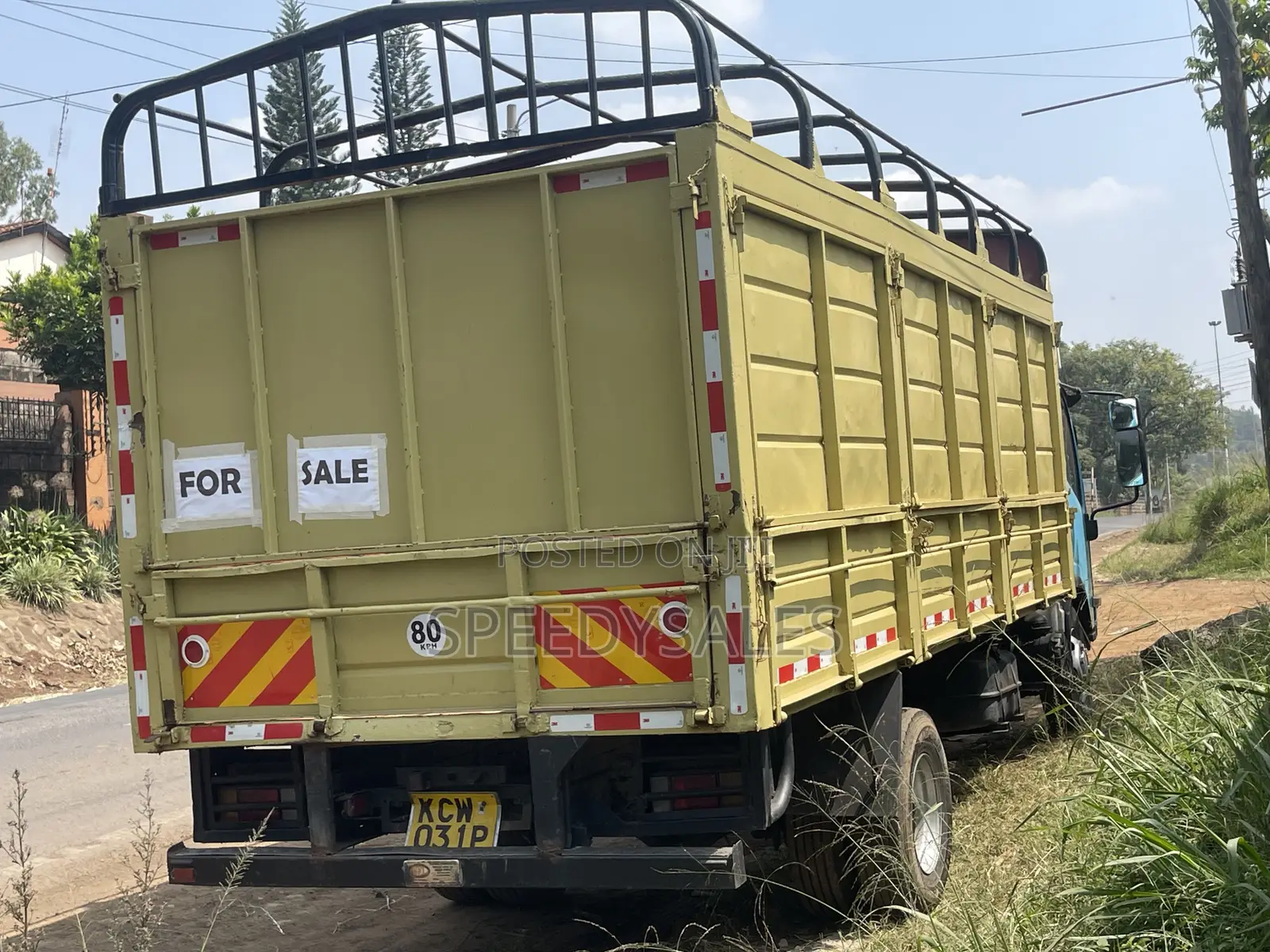 Isuzu NKR 75 Cargo Truck