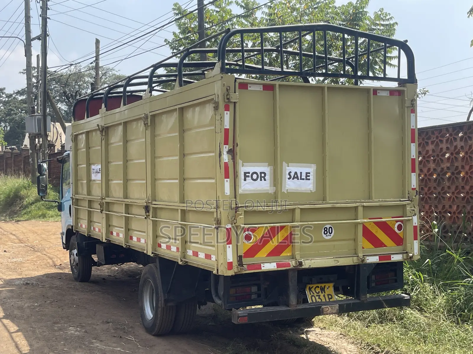 Isuzu NKR 75 Cargo Truck