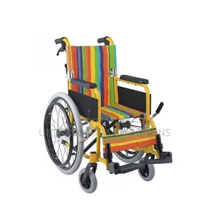 Pediatric Manual Wheelchair With a Colorful Rainbow-Striped Fabric