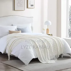 Knitted Tassel Throw Blankey