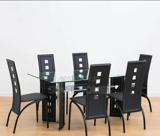 *Executive 6sitter Glass Dinning Table With Leather Seat