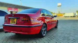 BMW 320i Sedan RWD 2004 Red