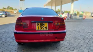 BMW 320i Sedan RWD 2004 Red