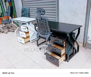 Office With Metallic Desk With Grey Lockable Drawer and Chair