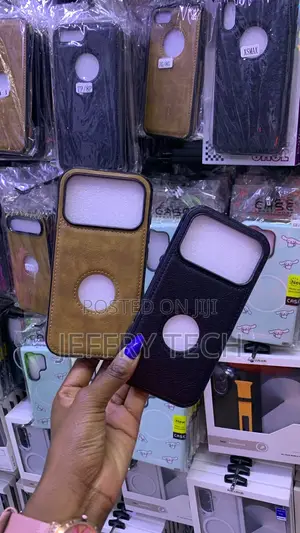 A Black Leather iPhone 17 Pro Max Case With a Circular Apple Logo