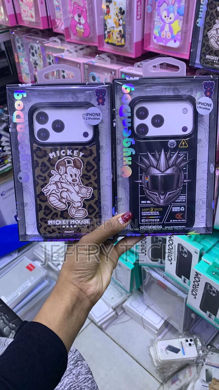Orange Phone Case and a Black Phone Case for the iPhone 17 Pro Max.