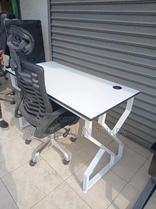 Metallic Table and Strong Mesh Headrest Chair