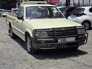 Mazda 1000 1998 Beige